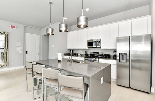 Reunion Hotel | Modern Condo with Large Outdoor Patio. Reunion Resort Water Park Access near Disney at Spectrum Resort Orlando by Rentyl – B9 #138