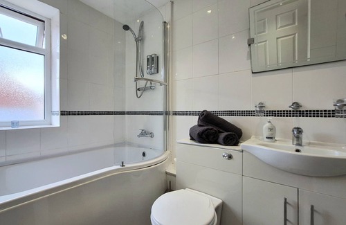 West Derby Cottage | Modern cottage set in a pretty village. Close to all amenities.