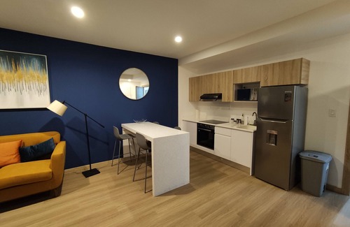 Zona 4 Apartment | Modern cozy apartment at Zona 4, with work-life style.