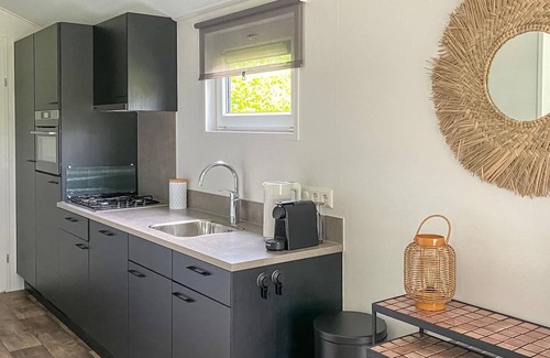 Oosterwolde House | Modern, cozy cottage on the lake.