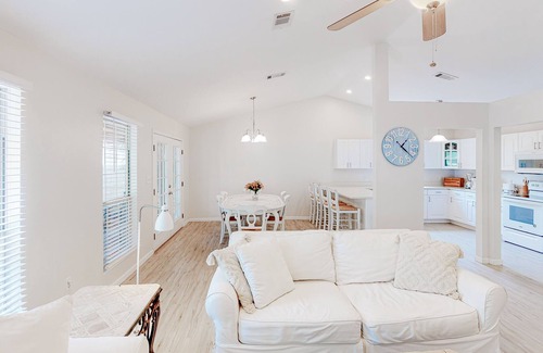 Gulfview Heights House | Modern dog-friendly home near the Gulf with yard, grill, screened porch & bikes
