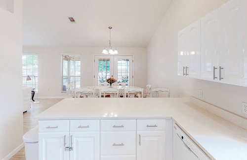 Gulfview Heights House | Modern dog-friendly home near the Gulf with yard, grill, screened porch & bikes