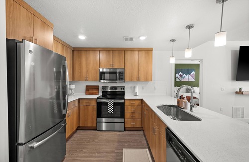 Rio Grande Apartment | Modern Downtown 2BR 2BA Near Delta Center with Fire Pit, BBQ, and City Views