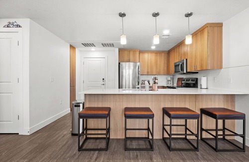 Rio Grande Apartment | Modern Downtown 2BR 2BA Near Delta Center with Fire Pit, BBQ, and City Views