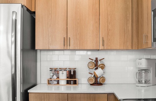 Rio Grande Apartment | Modern Downtown 2BR 2BA Near Delta Center with Fire Pit, BBQ, and City Views