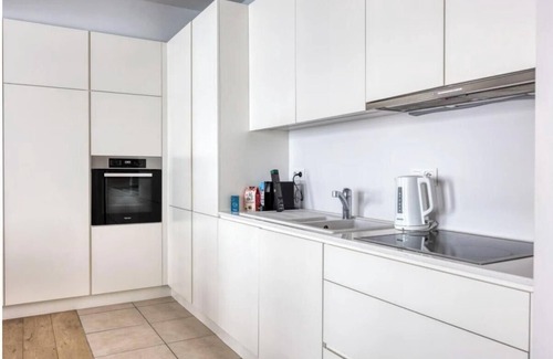 Postel Apartment | Modern Family Retreat in Stylish Toison d'Or District, Brussels