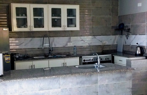 Luxor Apartment | Modern, fully furnished one bedroom Apartment with a supermarket on-site.