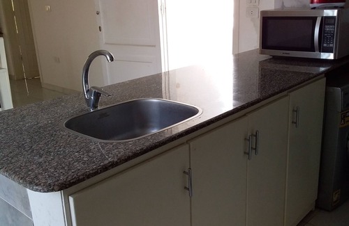 Luxor Apartment | Modern, fully furnished one bedroom Apartment with a supermarket on-site.