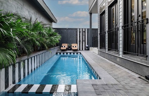 Lower Garden District House | Modern Garden District Oasis | Heated Pool and Spa
