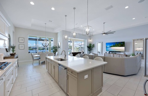 Biggar House | Modern Gulf Access Retreat w/Pool, Office & Outdoor Kitchen | Hidden Harbor, Fort Myers