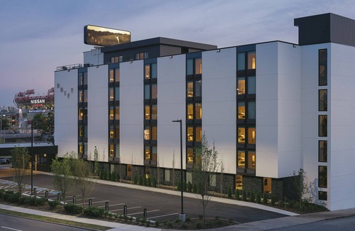 East Bank Hotel | Modern Hideaway with Rooftop Lounge, Pool, Firepits & City Views