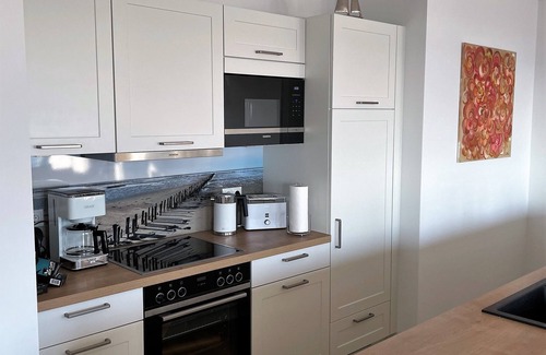 Schillig Apartment | Modern, high-quality vacation apartment, sauna, large balcony, sea view, close to the beach