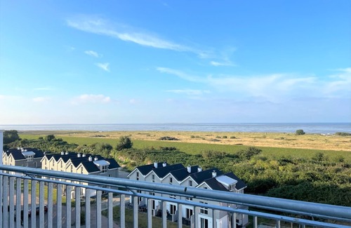 Schillig Apartment | Modern, high-quality vacation apartment, sauna, large balcony, sea view, close to the beach
