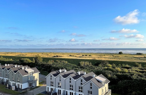 Schillig Apartment | Modern, high-quality vacation apartment, sauna, large balcony, sea view, close to the beach