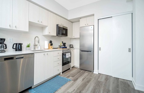 Kitchener Apartment | Modern High-Rise 24th Floor Condo w Private Patio