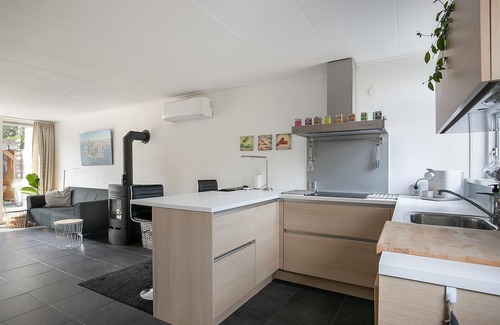 Grou House | Modern holiday home in Grou with bubble bath