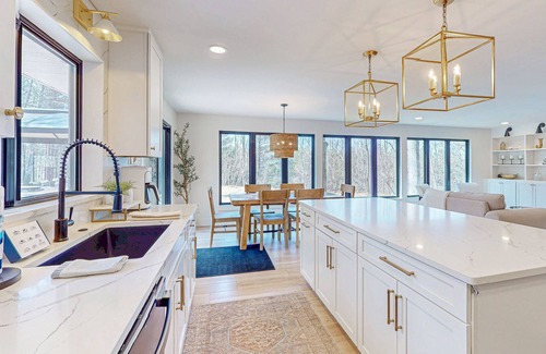 Bellaire House | Modern Home in the woods w/a large patio, gas grill, & near the lake