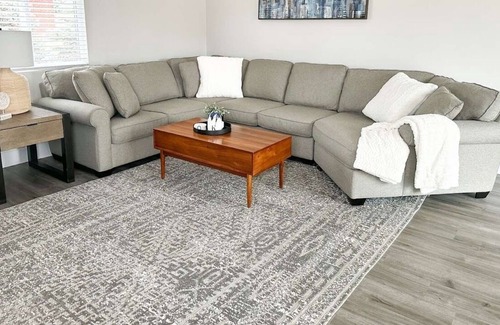 Lincoln House | Modern Home near downtown and UNL with Firepit, BBQ Grill & Air Hockey!