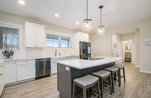 Sawyer House | Modern home with large sun-room, firepit, grill, washer/dryer, & central AC
