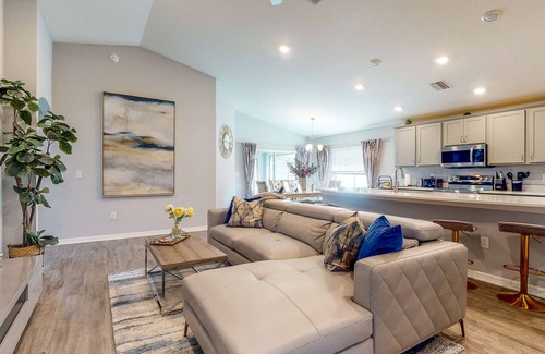 Palmetto House | Modern Home with Sunroom and Dazzling Kitchen