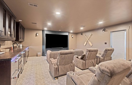 Clearwater House | Modern indulgence with media room, expansive waterway views, AC, WD and Wifi