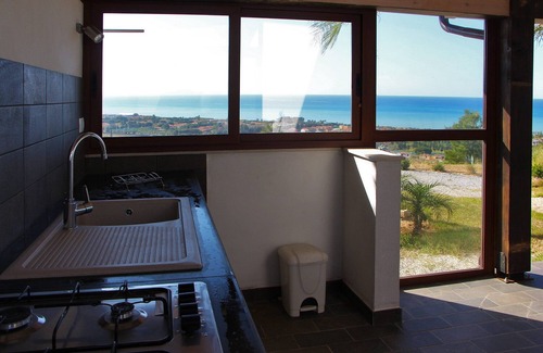 Campofelice di Roccella Villa | Modern Villa with Private Golf Practice, Pool, Garden, Terrace, Wi-Fi, Sea View