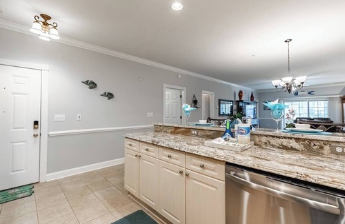 Central Myrtle Beach Apartment | Modern lake life on the first floor