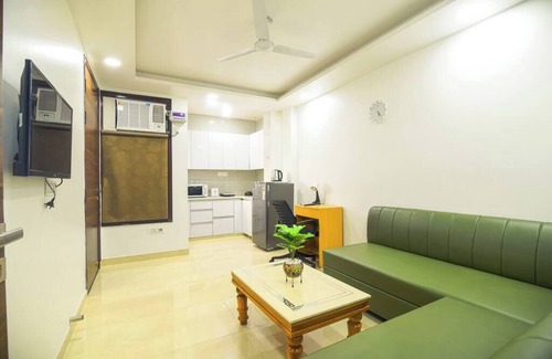 Gurugram Apartment | Modern loft overlooking hills and park