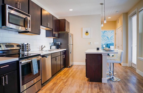 Highland Apartment | Modern Luxury Apt in Downtown Denver + King Bed + Private Garage + Pool