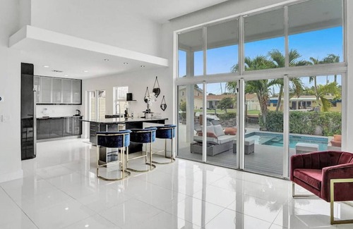 Pompano Isles House | Modern Luxury Waterfront Heated Pool Home