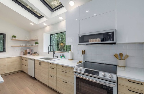 Woodmoor House | Modern Mountain Luxury - large forested lot with hot tub