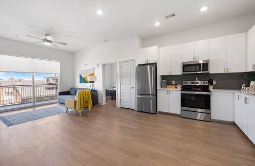 Downtown Louisville Apartment | Modern Nulu 2BR CozySuites 02