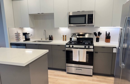 Lyon Street Apartment | Modern Oasis 10 Min from Disneyland W/Pool & GYM