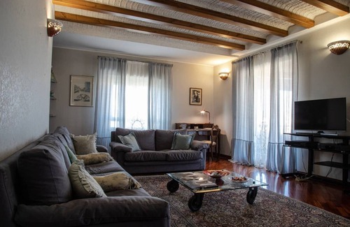 Garbatella House | Modern Pyramid Apartment with Terrace