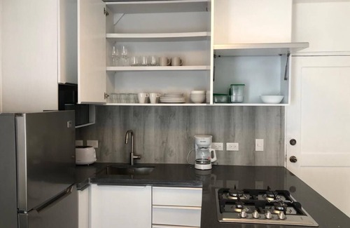 Cabarete Condo | Modern remodeled 1br/1ba condo steps from the beach!