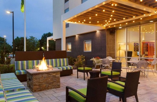 Newtonville Hotel | Modern Retreat: Pets Allowed, Onsite Pool. Close to Six Mile Waterworks!