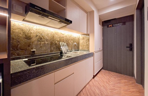 Pagedangan Apartment | Modern Rustic Studio Apartment At Carstensz Residence