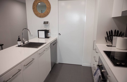 Belconnen Apartment | Modern spacious 1BDR, wifi, EV charging & parking, close to shops