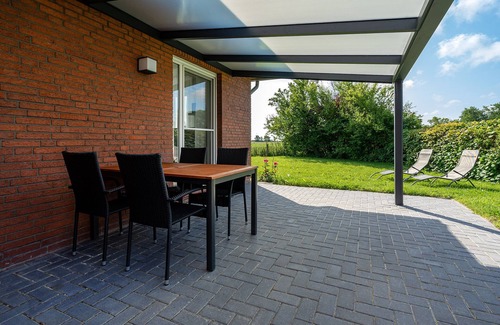 Greetsiel Apartment | Modern "Stuuv" vacation apartment with a view of the Greetsiel twin mills