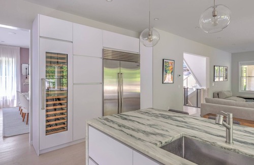 Amagansett North House | Modern-style home with heated private pool, open-floor plan, ample natural.