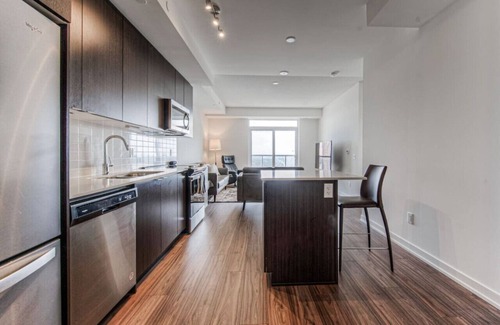 Kitchener Apartment | Modern Suite in the City
