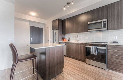 Kitchener Apartment | Modern Suite in the City