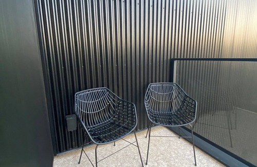 Courtenay House | Modern, sunny, eco retreat perched above a trendy jewelry studio!