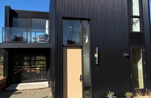 Courtenay House | Modern, sunny, eco retreat perched above a trendy jewelry studio!