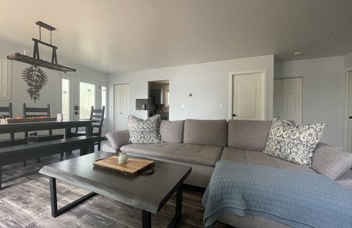 Stone Mills Cottage | Modern, Sunset-Facing Waterfront Cottage