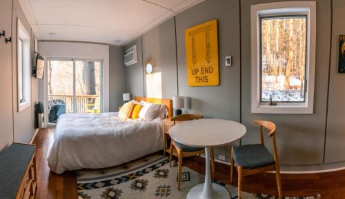 Johnson House | Modern Tiny House with hot tub & river near Stowe