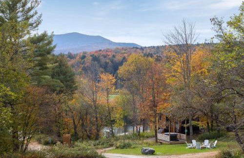 Johnson House | Modern Tiny House with hot tub & river near Stowe