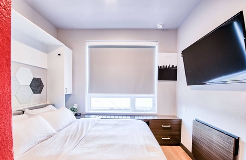 University District House | ⭐ Modern Tiny Studio 🌃 Free Parking, Hot Tub, Fitness Center, TV, WiFi, & More!
