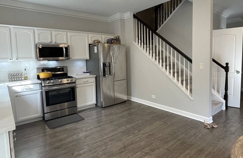 Elgin House | Modern Townhome with a theater room & gym area