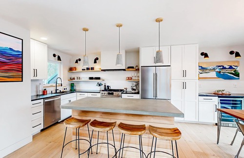 Alyeska Condo | Modern townhouse with private hot tub, mountain views, & natural light